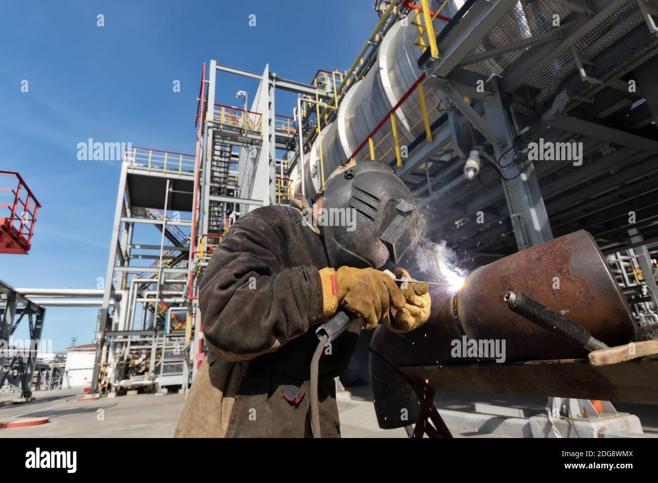 Welding works at installation of new pipeline Stock Photo