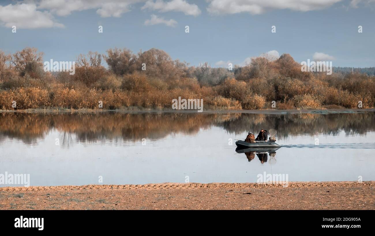 Autumn landscape on the river on a clear day Stock Photo