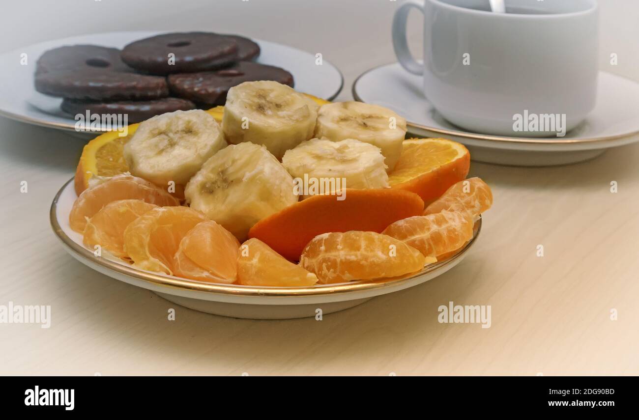Delicious cookies, tea and fruit. Stock Photo
