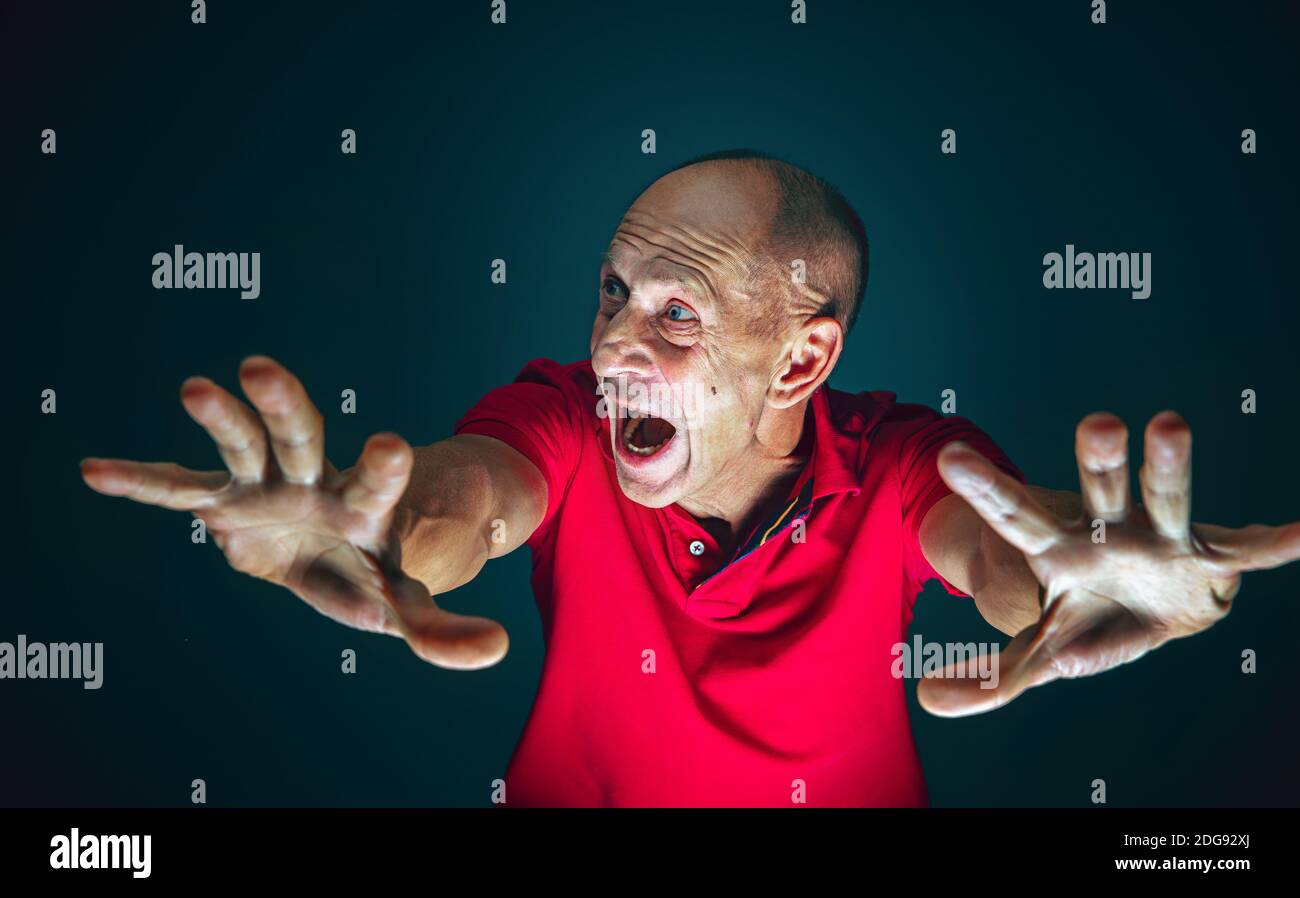 Scarded Human Pushing away from. Portrait of crazy scared and shocked caucasian man ...