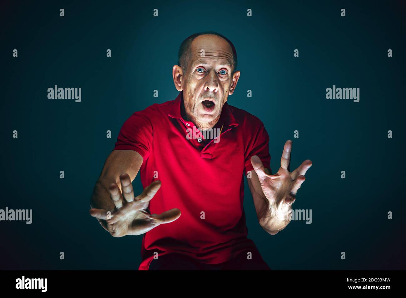 Scarded Human Ready to defend. Portrait of crazy scared and shocked caucasian man ...
