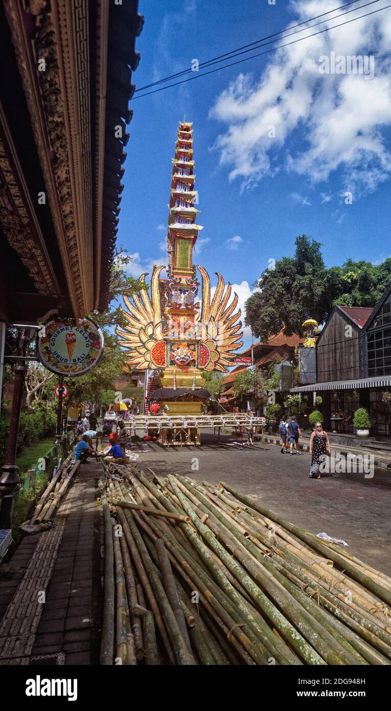 Ceremonial funeral pyre under construction and decoration close to Ubud