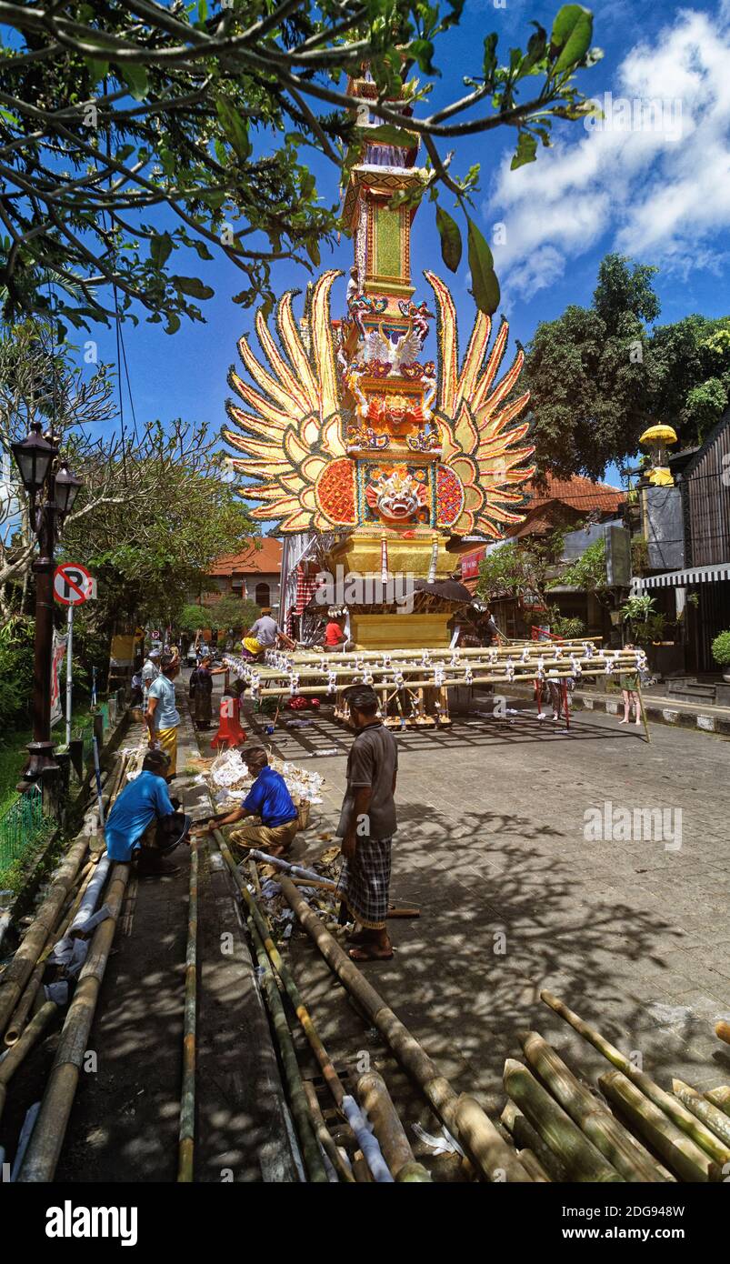 Ceremonial funeral pyre under construction and decoration close to Ubud