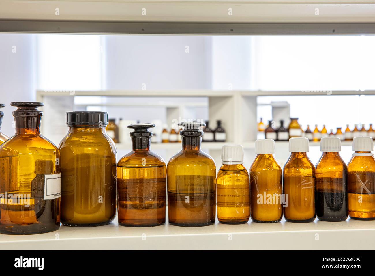 Close up amber color bottles in laboratory. Amber bottle for storing