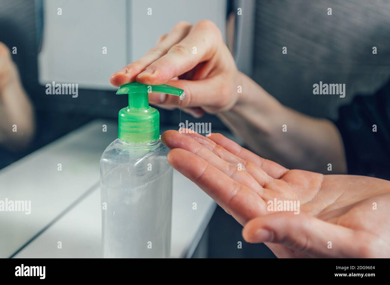 close up. a young man washes his hands with soap. Stock Photo