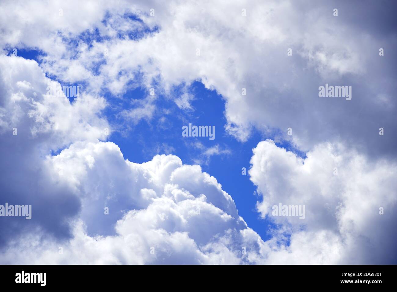 background of clouds over blue sky. concept clearing against bad weather Stock Photo