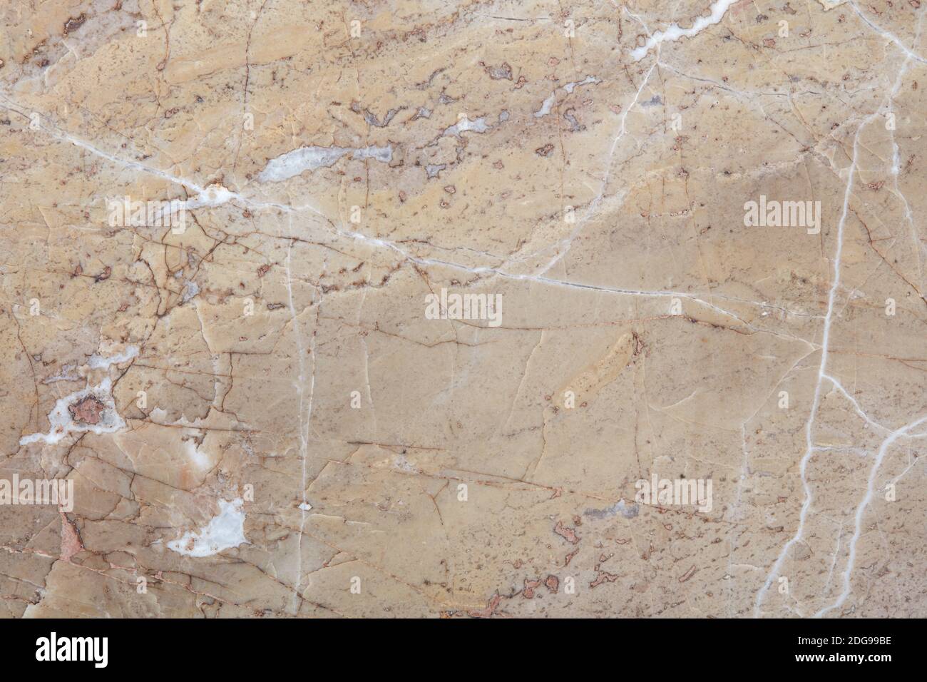 Beige, polished stone texture background with white veins Stock Photo