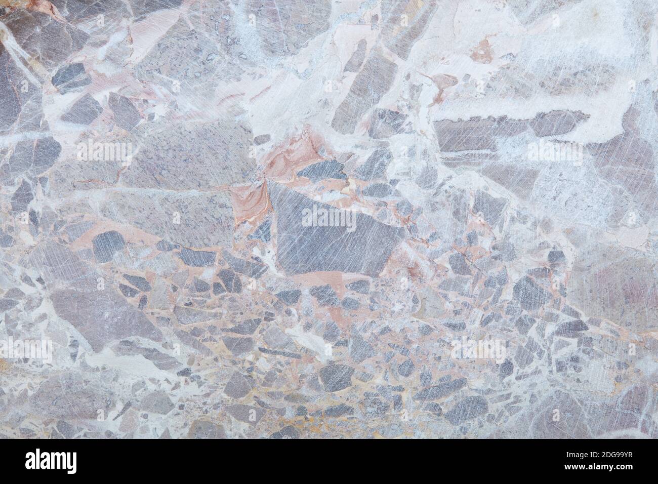 Variegated stone in gray, white and brown colors texture background Stock Photo