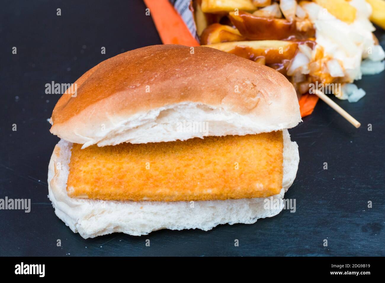 fried mozzarella cheese and fried hotdog with soft white bread and