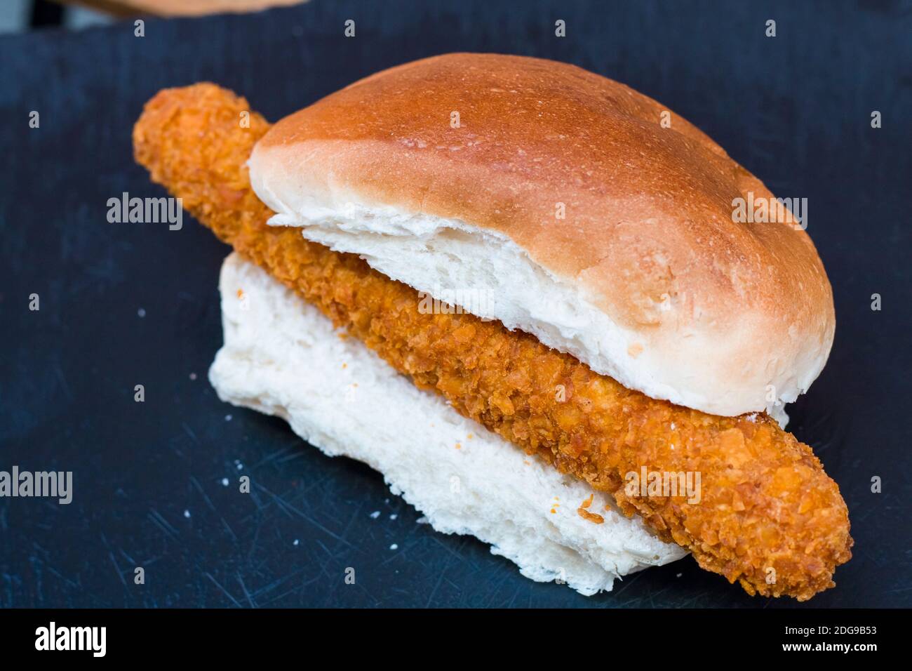 fried mozzarella cheese and fried hotdog with soft white bread and