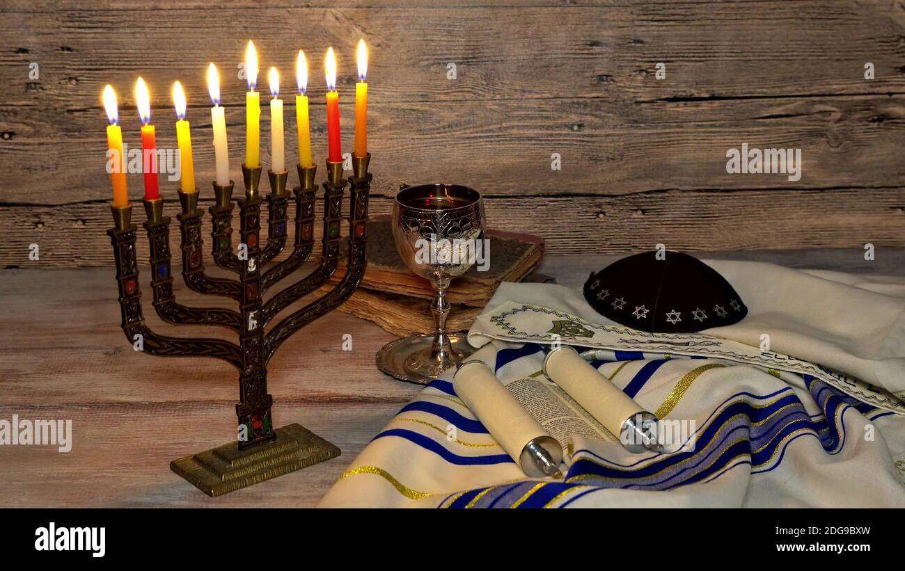 Jewish holiday, Holiday symbol Hanukkah Brightly Glowing Hanukkah Menorah Stock Photo