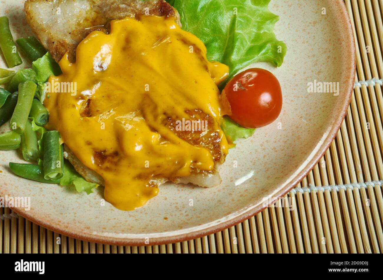 Pork chops and Sauce poivrade, classic French pepper sauce Stock Photo -  Alamy