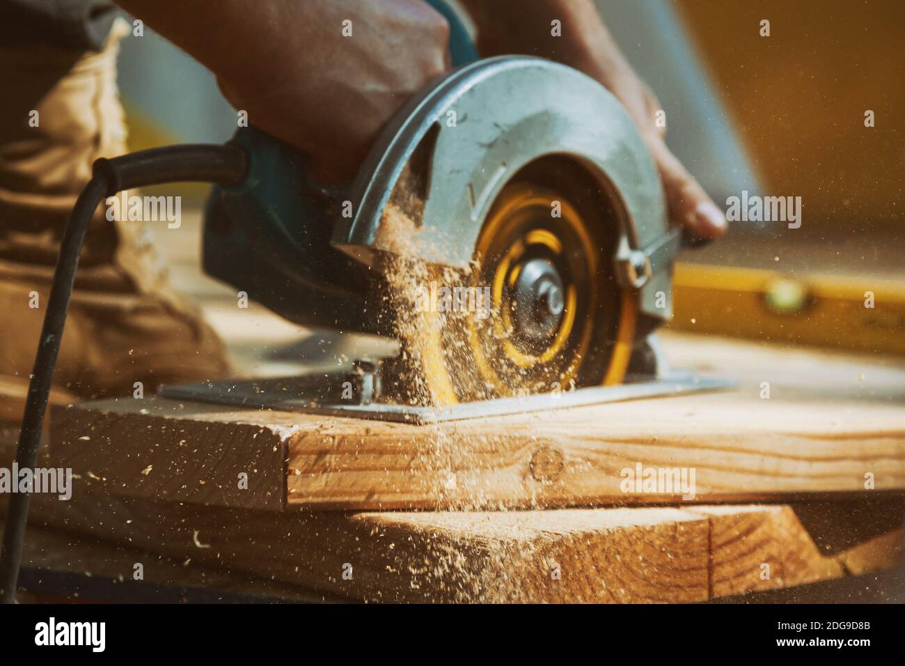 Using saw to cut wood hi-res stock photography and images - Alamy