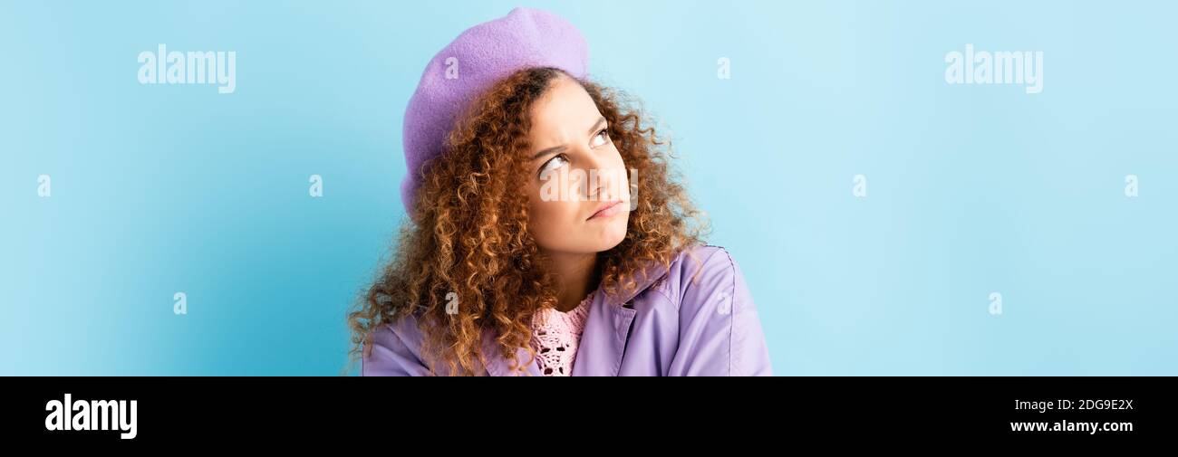 Displeased woman in beret hi-res stock photography and images - Alamy