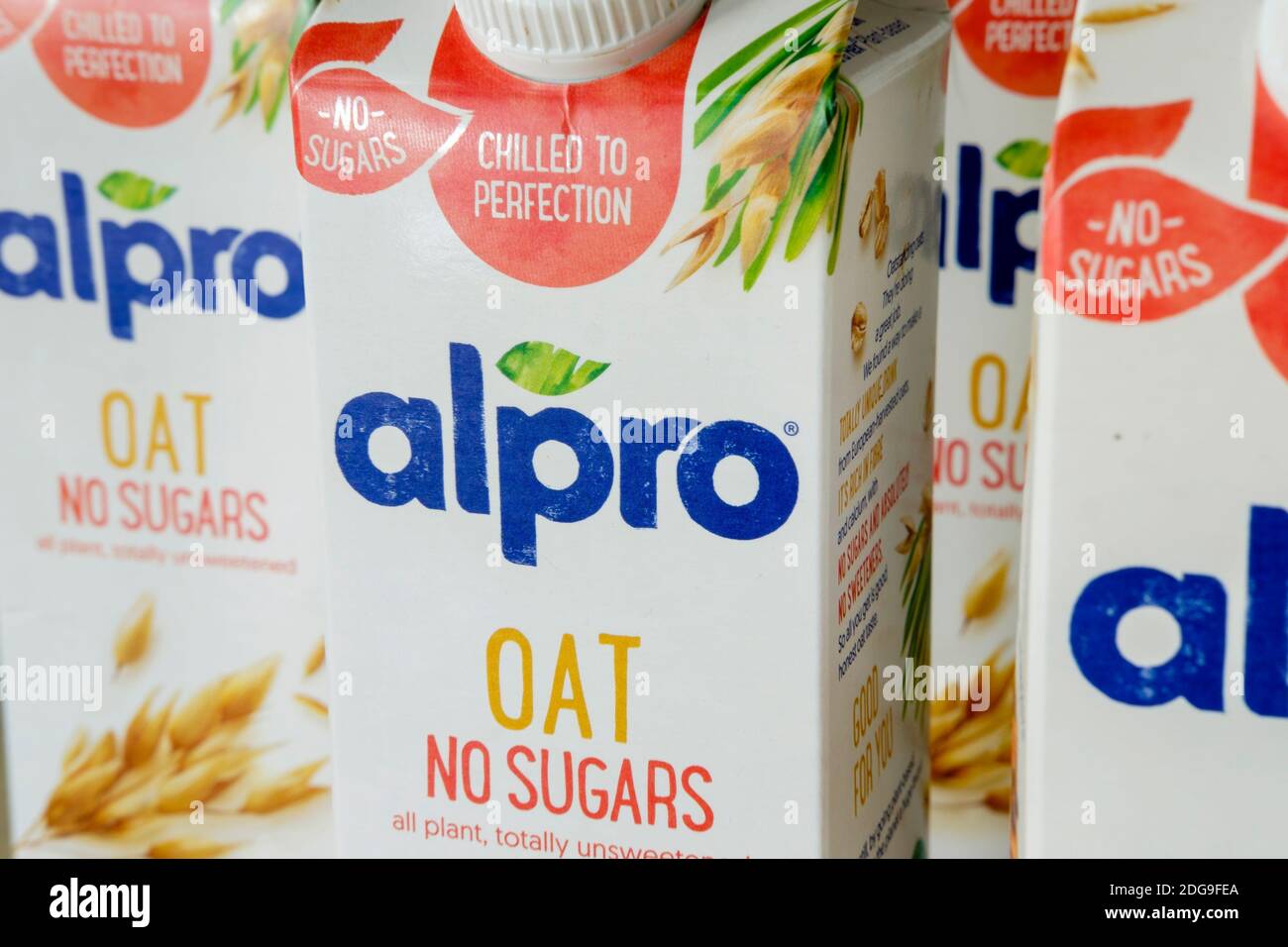 Cartons of alpro milk alternative oat drink Stock Photo