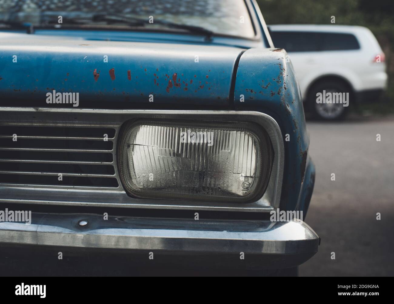 Front view of blue rusty old retro automobile Stock Photo - Alamy