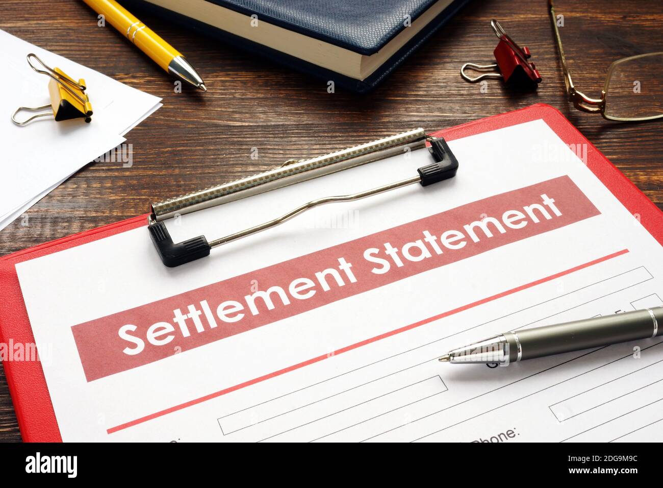 Settlement statement empty form with grey pen. Stock Photo