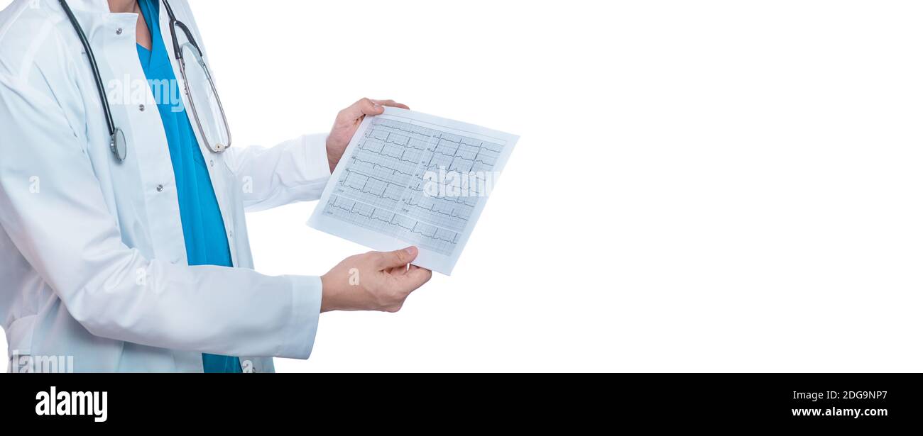 doctor with stethoscope holds a cardiogram test results and ECG report, isolated on white. Diagnostic heart disease heart attack, tachycardia Stock Photo