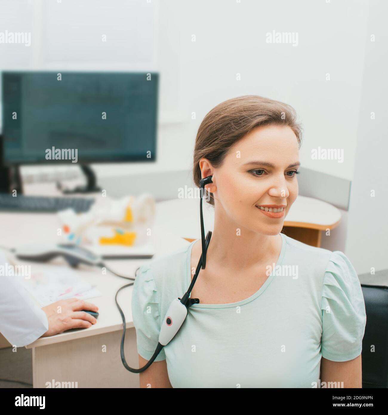 Impedance audiometry, tympanometry. Caucasian woman having a hearing
