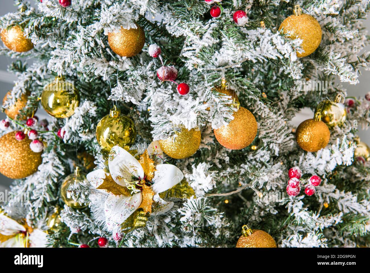 Christmas tree background with golden balls, toys Stock Photo - Alamy