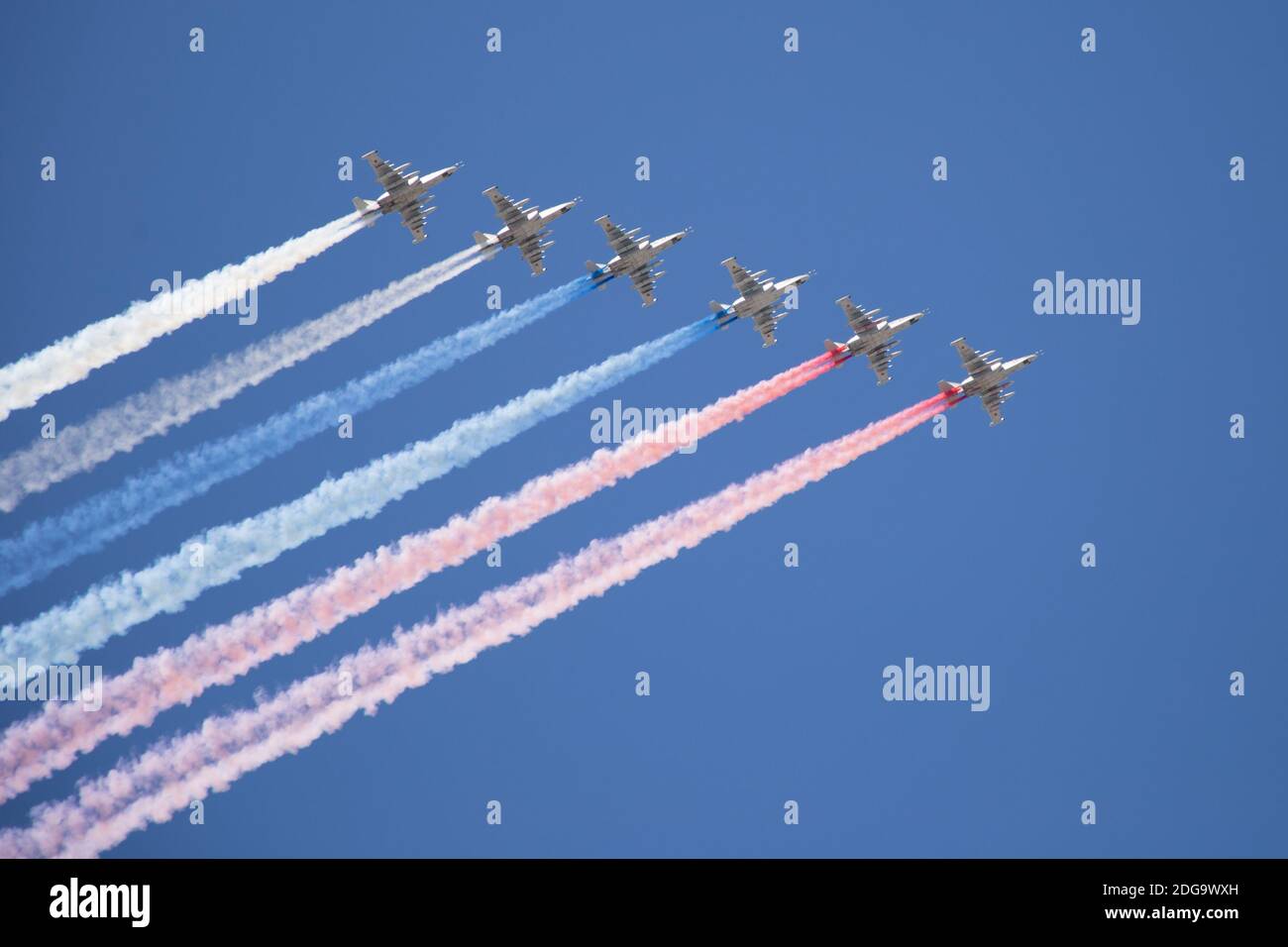 07.26.2020. Russia, St. Petersburg: Aviation parade. The military aviation parade on the Day of the Navy. A group of Su-25 attack aircraft draws the R Stock Photo