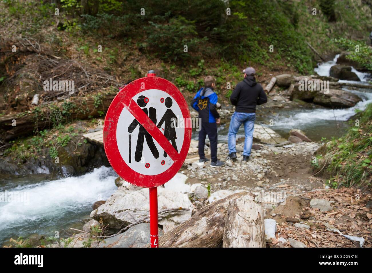 Russia. Krasnodar region. Walk denial sign in the mountains. Stock Photo