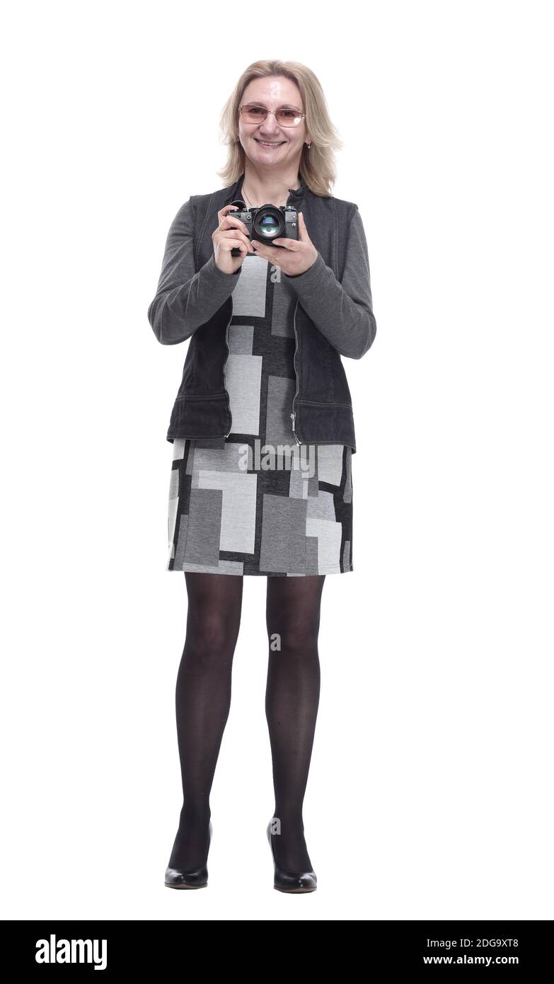 casual young woman with a camera . isolated on a white Stock Photo