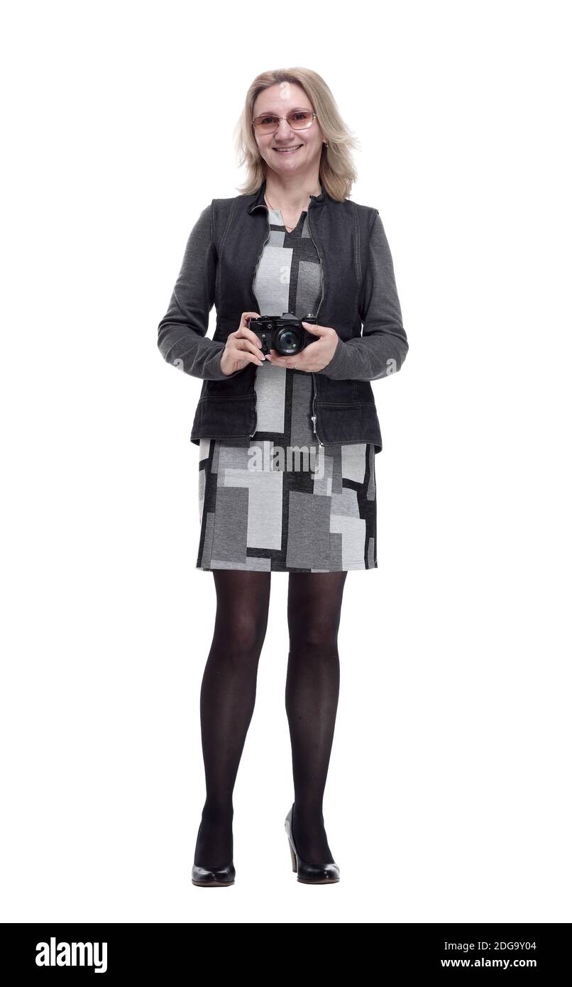 attractive young woman with a photo camera . isolated on a white Stock Photo