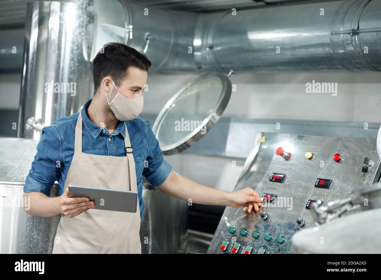 Management of large brewery during social distancing Stock Photo