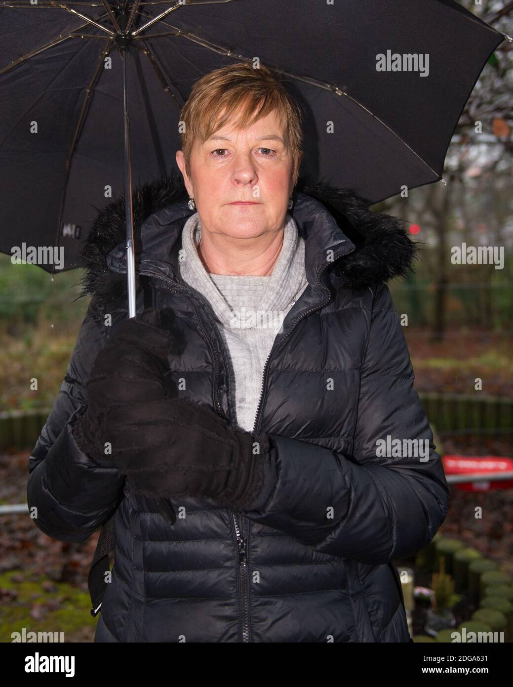 Glasgow, Scotland, UK. 8 December 2020. Pictured: Cllr Maureen Burke - Councillor of Ward 21 of Glasgow North East. SiMBA Charity's Tree Of Tranquility and their ornate bench has been severely vandalised and set fire by vandals leaving their cigarette lighter behind. Distraught and bereaved Parents, Kat and Fraser made the horrific discovery as they visited SiMBA's memorial garden. Credit Colin Fisher/Alamy Live News. Stock Photo