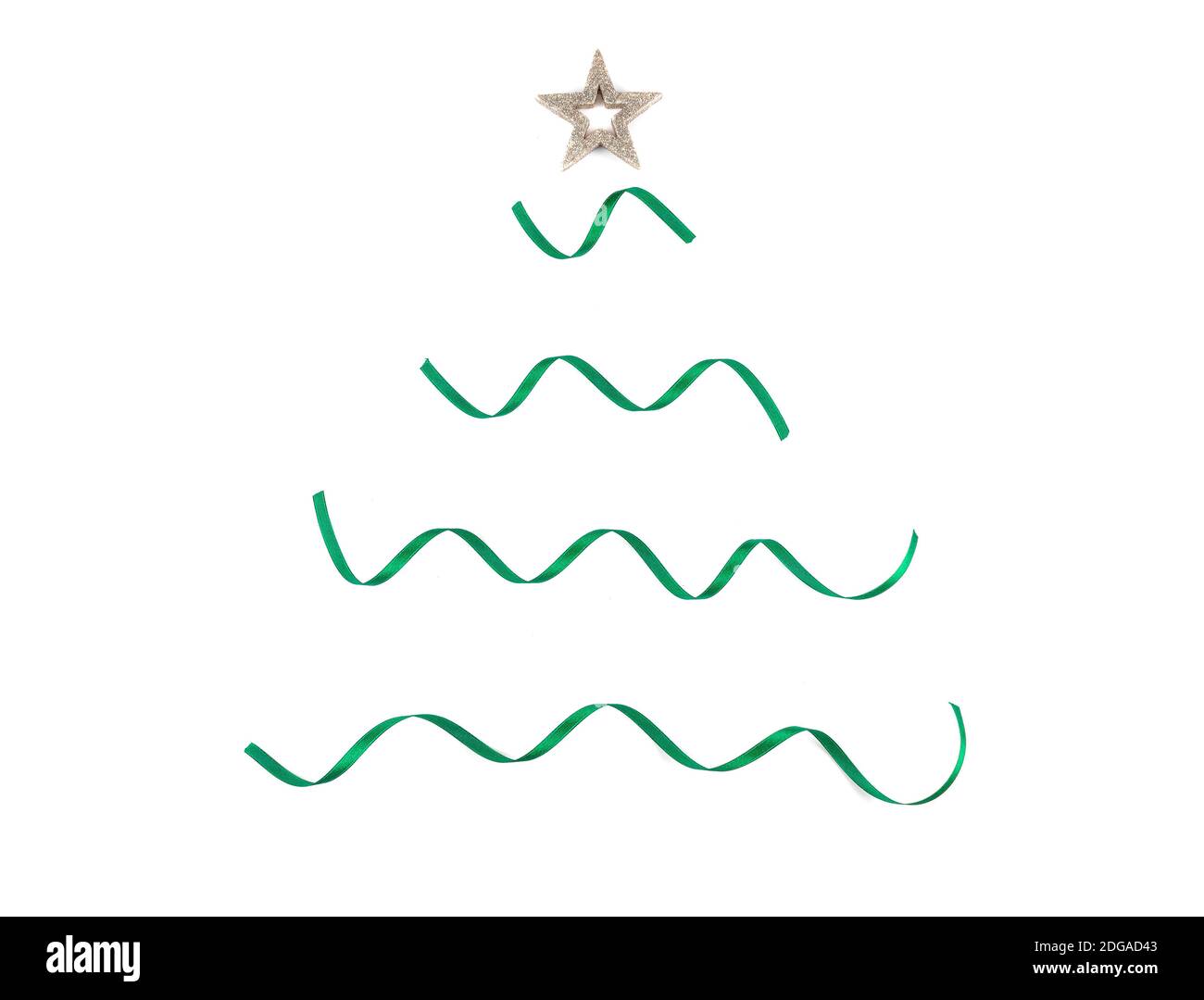 Minimalist ribbon Christmas tree with a gold star. Simple green and ...
