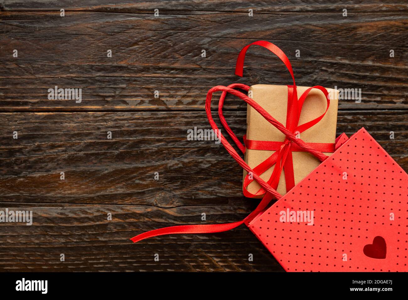Paper craft Gift box with red ribbon bow, paper bag and red hearts ...
