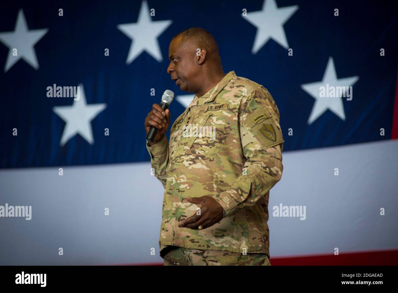 U.S. Army Gen. Lloyd J. Austin III, commander, U.S. Central Command, addresses the crew of the Nimitz-class aircraft carrier USS Carl Vinson November 25, 2014 in the Arabian Gulf. Stock Photo