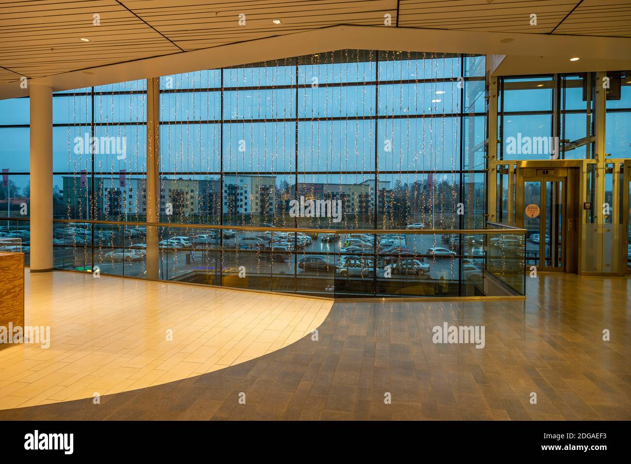 Beautiful interior view of trading mall hall. Festive lighting decorated  glass wall with view on parking lot. Europe. Sweden. Uppsala Stock Photo -  Alamy