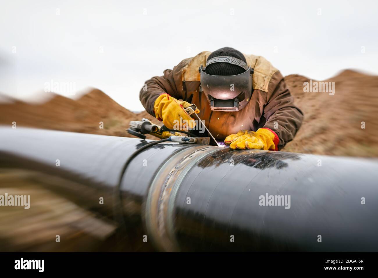 Welding works on gas pipeline Stock Photo
