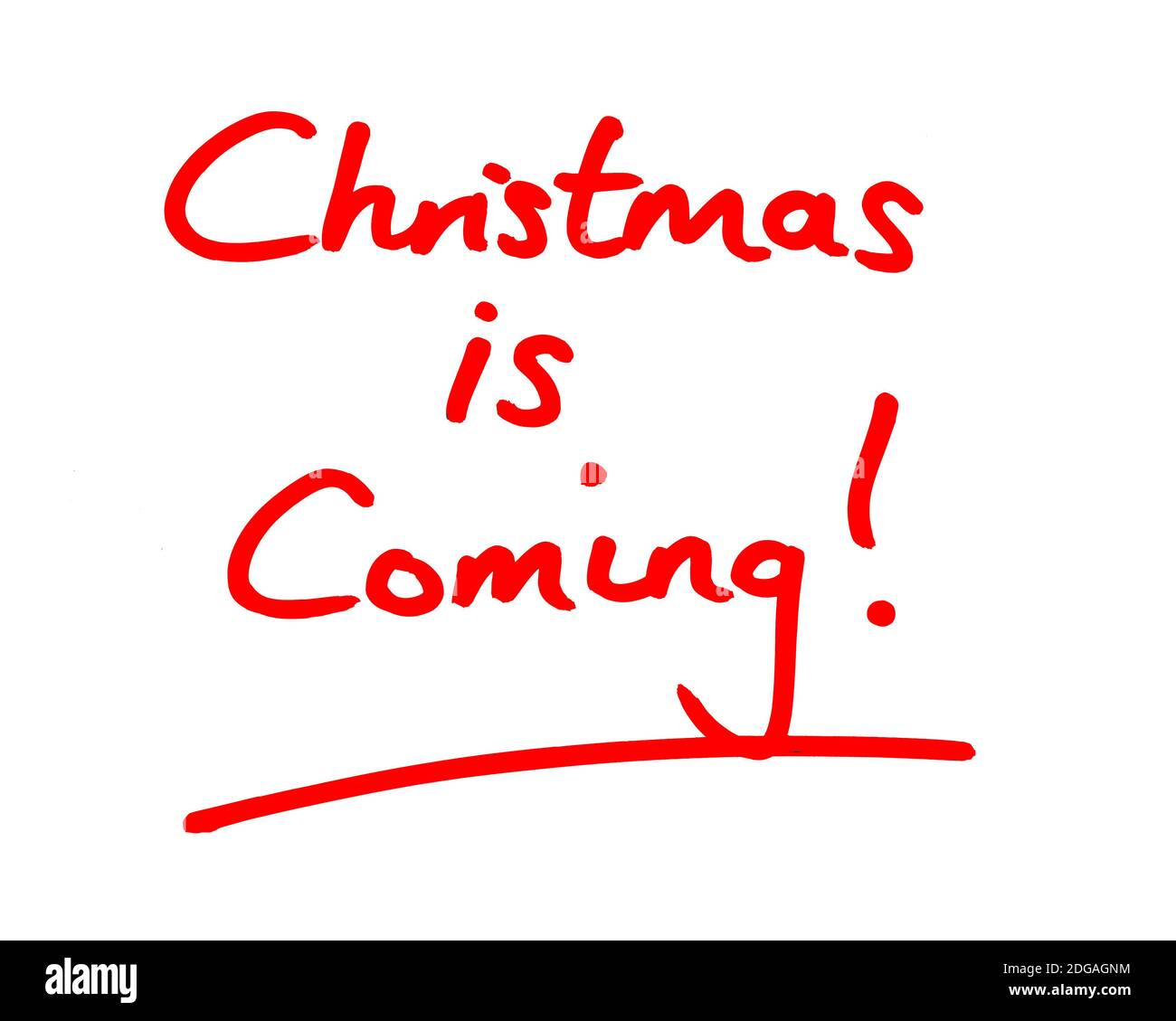 Christmas is Coming! handwritten on a white background. Stock Photo