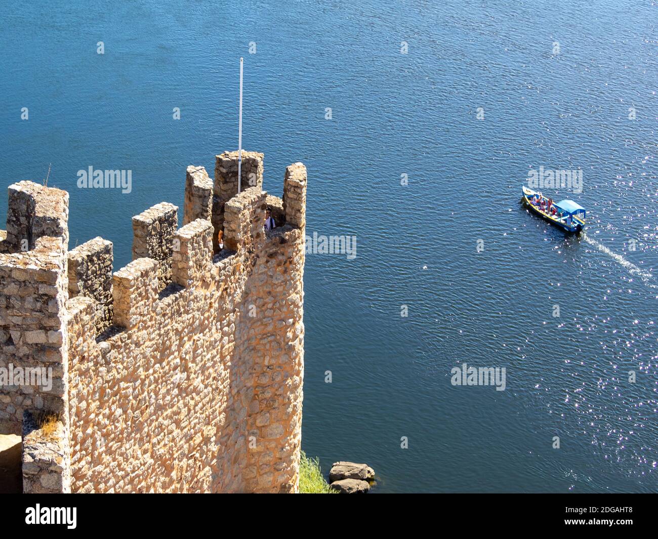 Tourist transportation boat in Tagus River seen from the top of Almorol castle tower Stock Photo