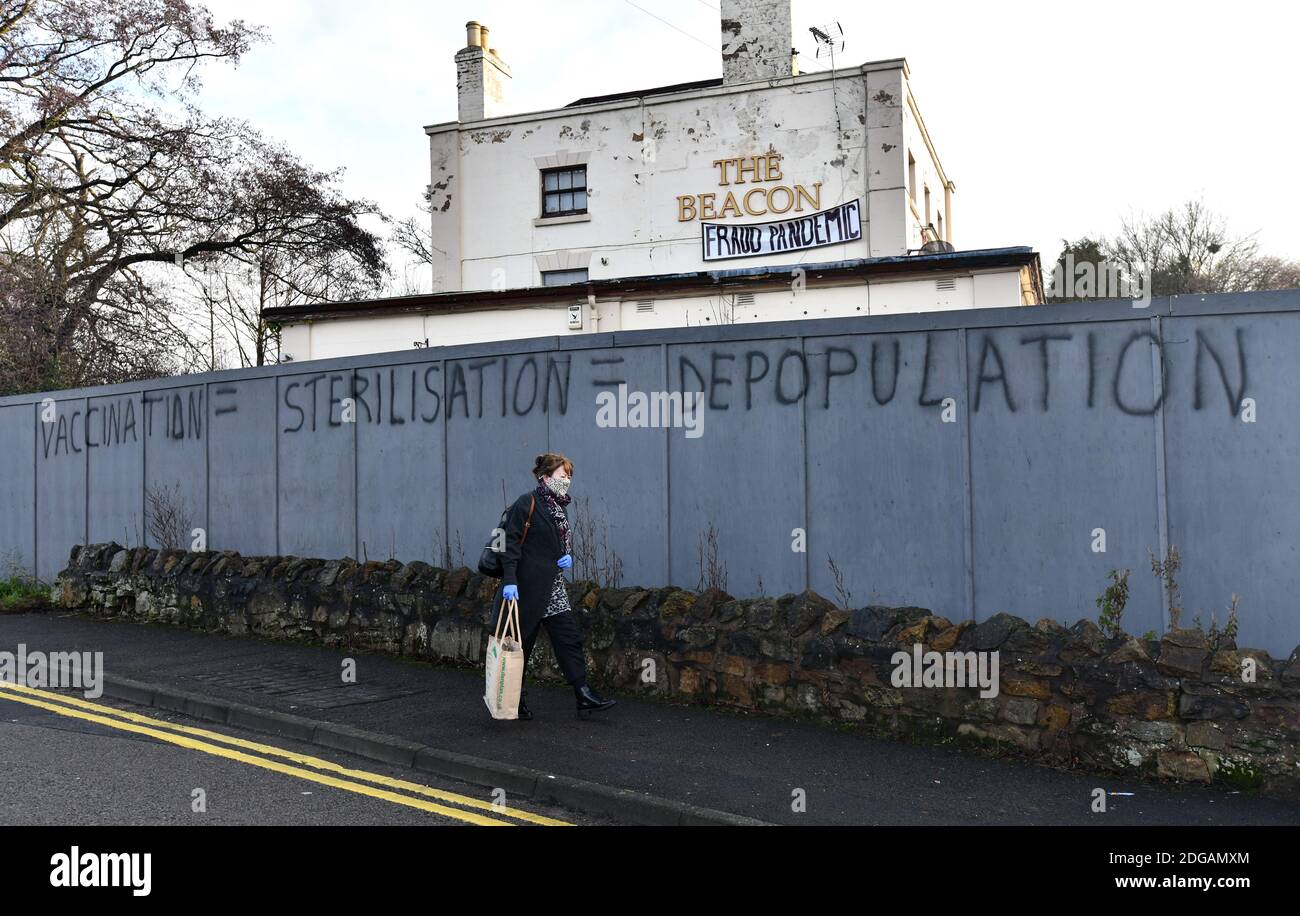 Anti vaccination propaganda graffiti sprayed on walls around a disused pub in Madeley, Telford, Shropshire. anti vaccine  Credit: David Bagnall Stock Photo