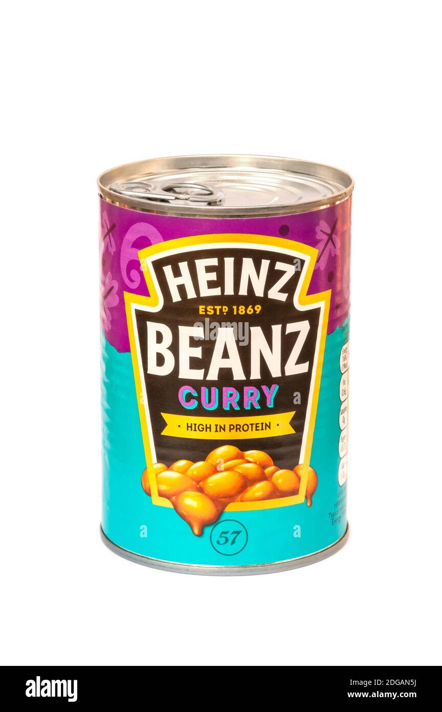 Isolated can of Heinz baked beans in a curry sauce. The H.J. Heinz food company has been manufacturing food products since 1896: Yateley, UK - Septemb Stock Photo