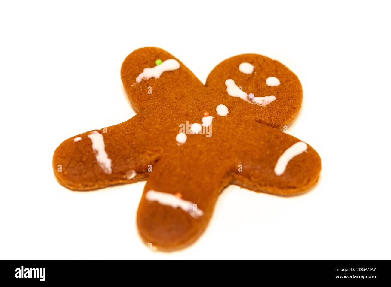 A gingerbread man made by a child isolated on a white background Stock Photo