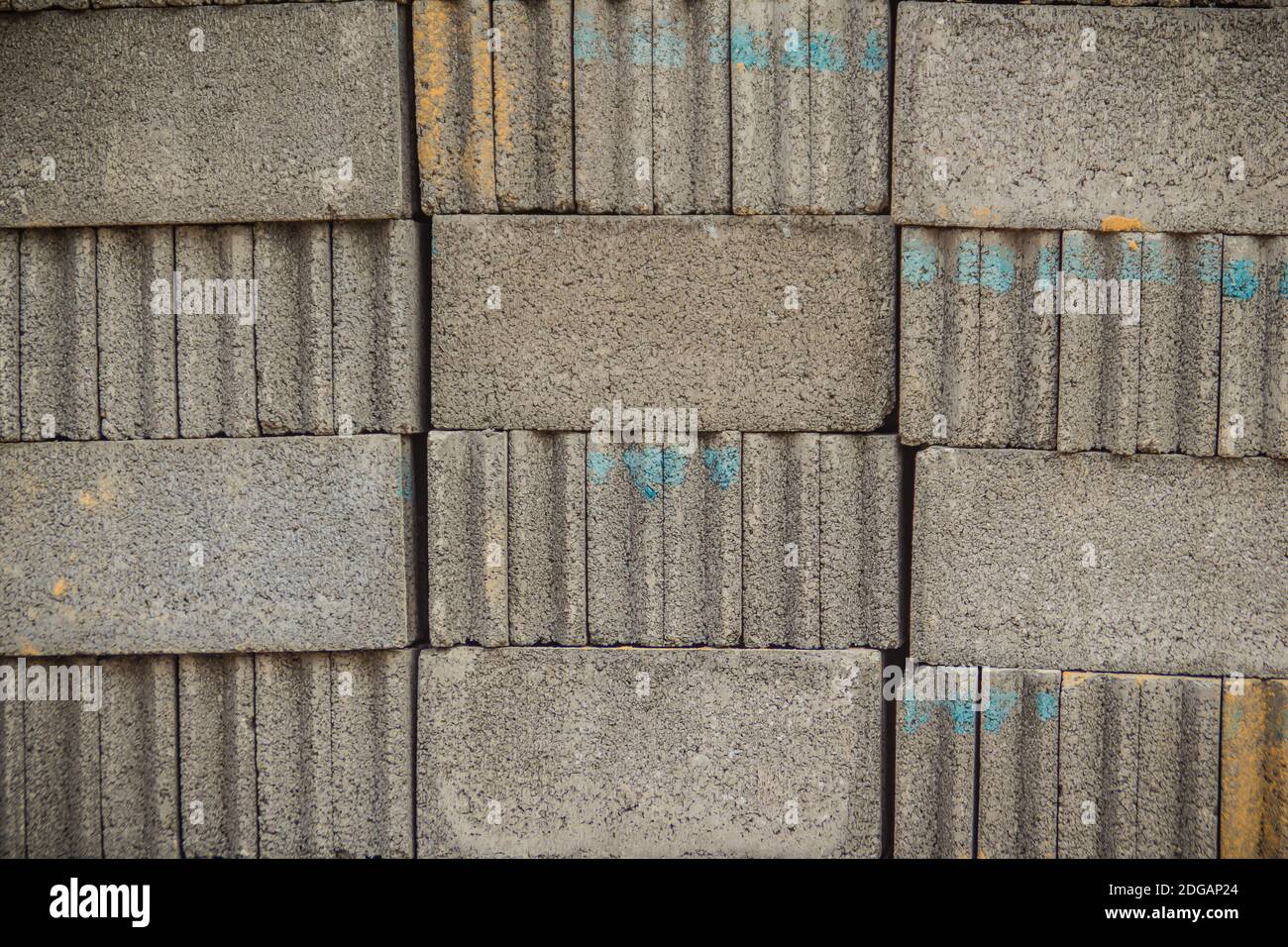 Grey concrete blocks on the pallet for construction. Background and