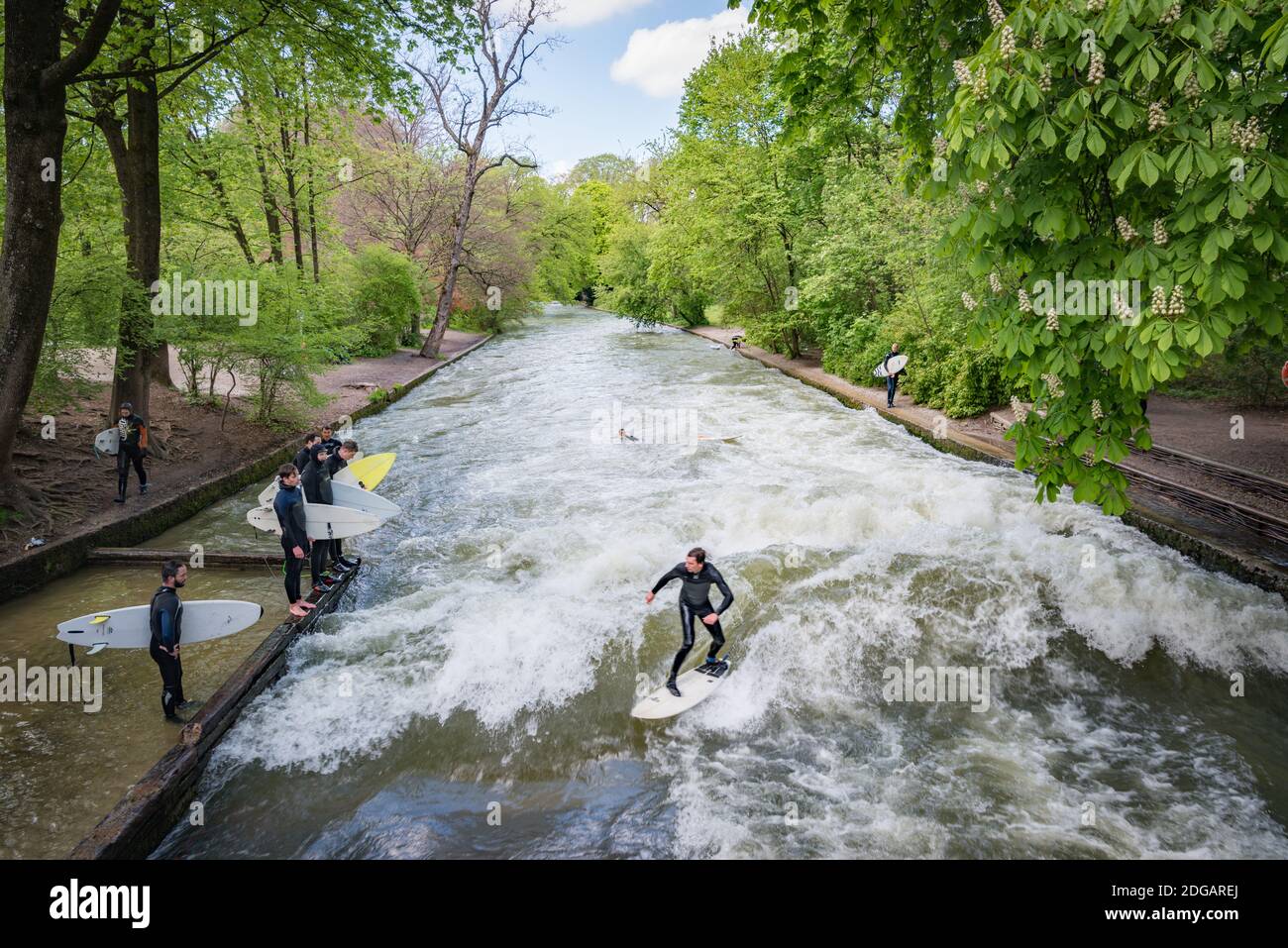 Surfing in the river Eisbach, Munich, Germany Stock Photo