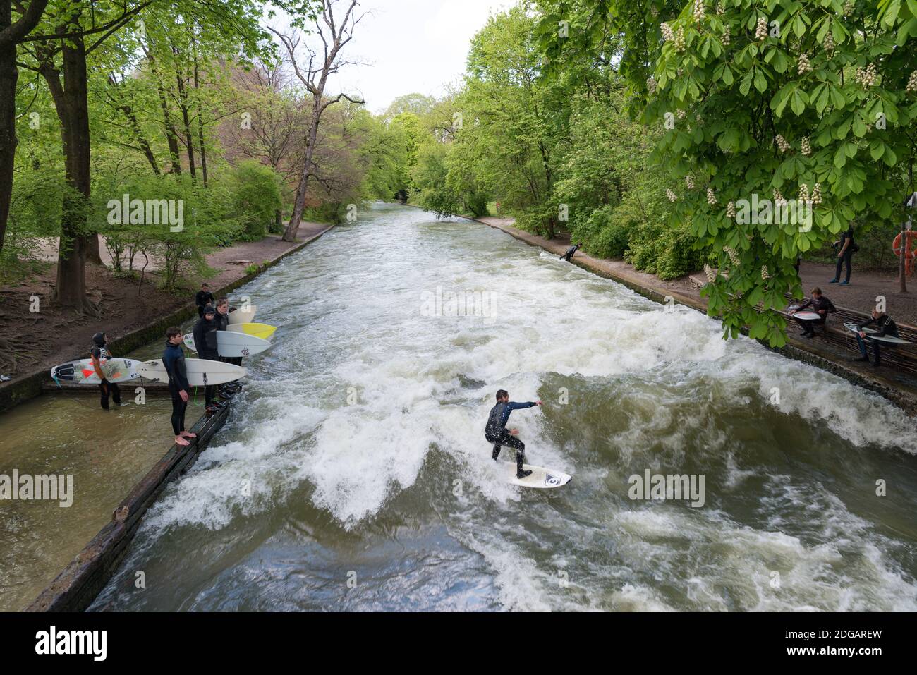 Surfing in the river Eisbach, Munich, Germany Stock Photo