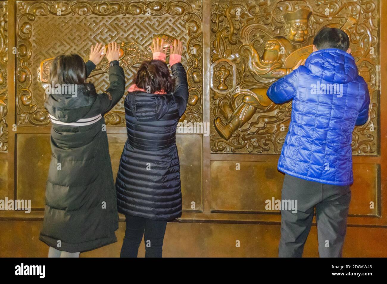 People Praying at Jingan Temple, Shanghai, China Stock Photo