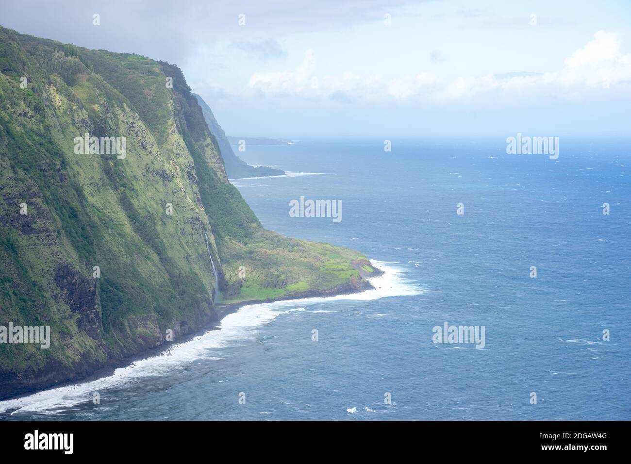 Cliffs north of Waipio valley, viewed from above on partially cloudy day - Hawaii island, Hawaii, USA Stock Photo