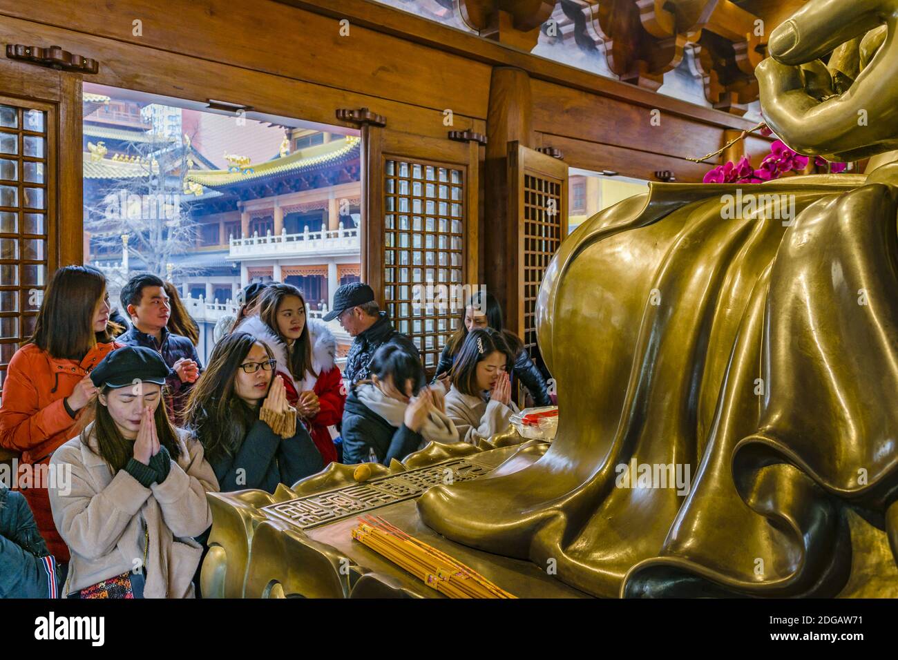 People Praying at Jingan Temple, Shanghai, China Stock Photo