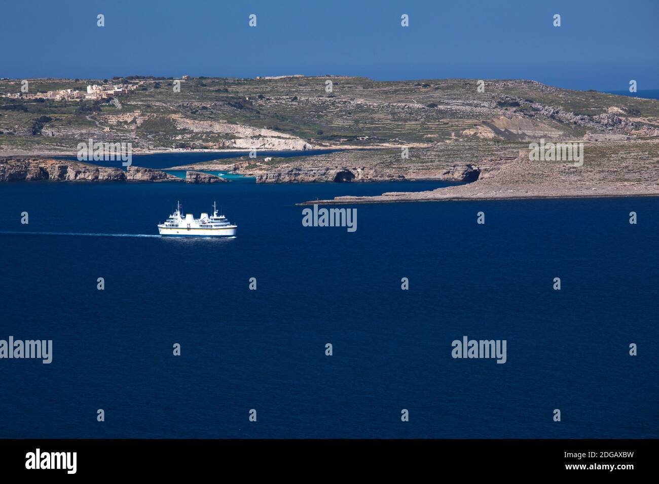 High angle view of Malta-Gozo ferry from Ras al Qammie Point cliffs, Cirkewwa, Malta Stock Photo