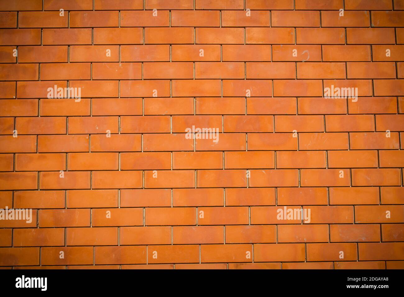 Clean newly red brick wall pattern. Abstract red new brick background. Red new brick wall pattern background. Stock Photo