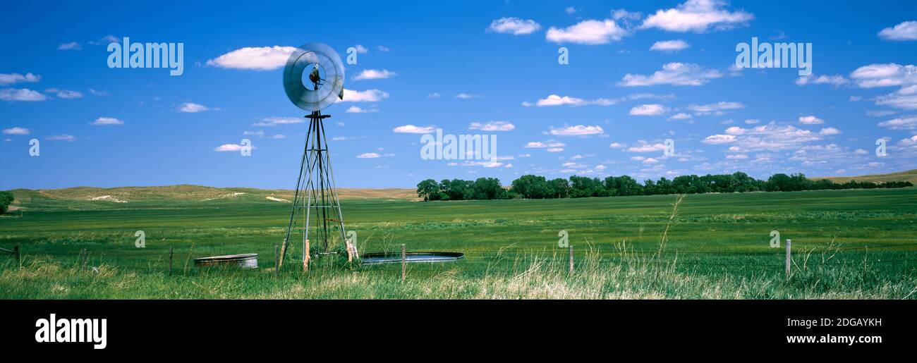 Windmill in a field, Nebraska, USA Stock Photo