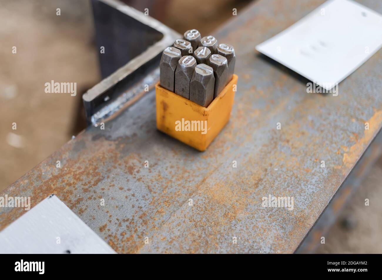 A set of cores with numbers for knocking out numbers on the plates Stock Photo